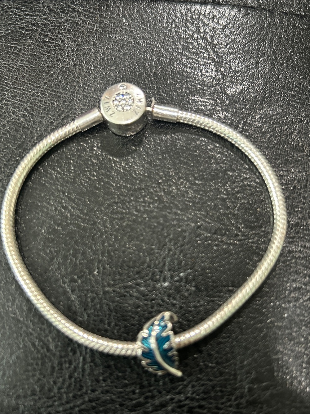 Sterling Silver Bracelet with Blue Enamel Feather Charm